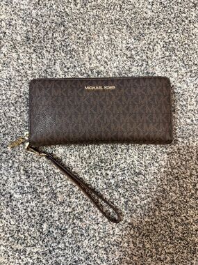 Michael Kors Brown Monogram Wristlet with Gold Hardware